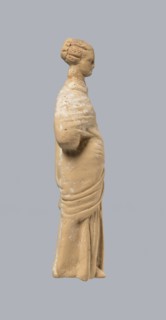 Terracotta figurine of a standing woman, terracotta, female figurine, himation, chiton, Tanagra