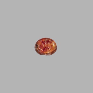 Gemma intaglio with a depiction of an eagle standing on an altar, with cornucopias on the sides;