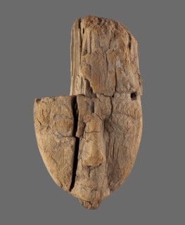 Sarcophagus mask with part of a wig preserved over the central and left part of the face and a