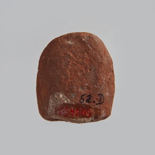 Mold for pressing a figurine of Ptah the dwarf probably made by pressing from a stone matrix. The