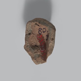 Head of a man. Fragment of a terracotta figurine showing the head of an elderly man. Thin face with