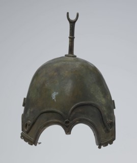 Bronze helmet, 4th–3rd century BC, Italy, armament; materials: bronze; height 27 cm without cheek