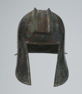 Bronze helmet, circa 550–500 BC, possibly Italy; armament. Dimensions: height 24 cm, width 18.5 cm,