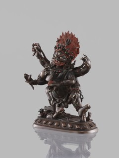Six-armed Mahakala, dharmapala iconography, lotus throne, Tibetan Buddhist art, sculpture, 19th