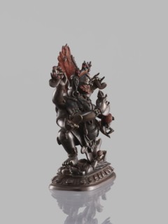 Six-armed Mahakala, dharmapala depicted seated on a lotus throne; Tibetan Buddhist sculpture, 19th