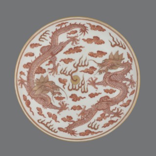 Plate., Porcelain dish decorated in the mirror and on the outer wall with a pair of dragons with a
