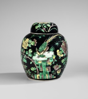 Ginger vessel with lid, porcelain pot decorated with overglaze enamel paints on a black background;