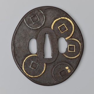 Crossguard tsuba, Umetada school; maker: Umetada Shigeyoshi. Oval tsuba tatemaru gata with a