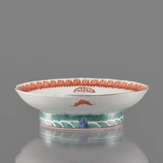Bowl stand., Porcelain body with white glaze; decoration painted with overglaze iron red, blue and