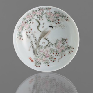 Bowl on a high foot, ceramics; bowl with painted images of birds; colored porcelain with white