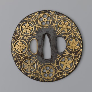 Crossguard tsuba, sword crossguard of maru gata round tsuba mon-sukashi type, decorated with eight