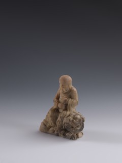 Luohan on a lion, arhat iconography, lion iconography, figurine, Chinese art, Qing 1644–1911,