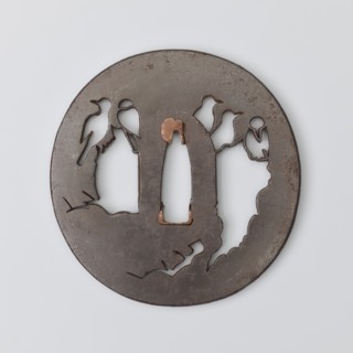 Crossguard tsuba, Higo school; maker Tokishige. Round tsuba maru gata with rectangular edge kaku