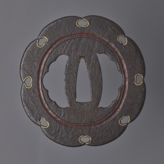 Crossguard tsuba, Kasuga school; maker: Kunihide. Tsuba in the shape of an eight-petaled flower