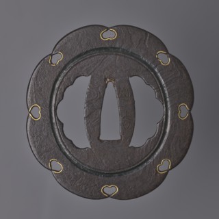 Crossguard tsuba, Kasuga school; maker: Kunihide. Tsuba in the shape of an eight-petaled flower