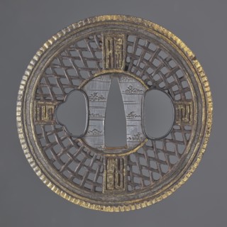 Crossguard tsuba, Round tsuba maru gata in the Chinese Cantonese style, with a distinct, finely