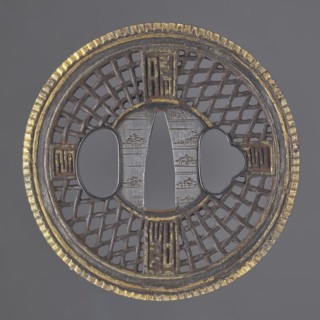 Crossguard tsuba, Round tsuba maru gata in the Chinese Cantonese style with a distinct finely