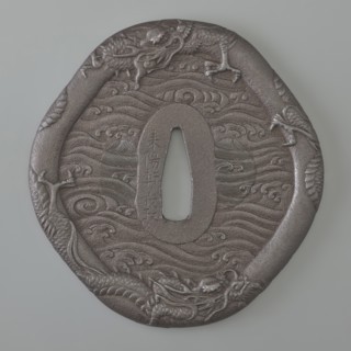 Crossguard tsuba, Raiyôken, Yoshimasa maker, sword crossguard in the shape of an otafuku chubby