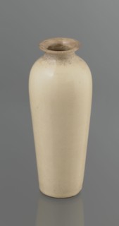 Cylindrical porcelain vase, tapering towards the bottom; flat rim. Light cream glaze with fine