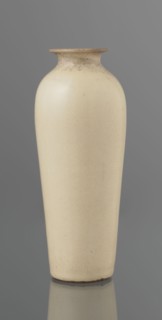 Vase on saucer. Cylindrical porcelain vase tapering toward the bottom with a flat rim; light cream