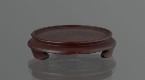 Vase on saucer. Cylindrical porcelain vase tapering toward the bottom with a flat rim. Light cream