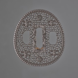Crossguard tsuba, sword crossguard in namban style, openwork egg-shaped tsuba with a separated edge