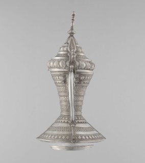 Teapot, Persian, Qajar dynasty 1785–1925. Silver teapot vessel with geometric motifs, used as a