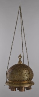 Lamp, Islamic art, Arabic culture, metals, lighting, geometric ornament, Arabic inscriptions. Cover