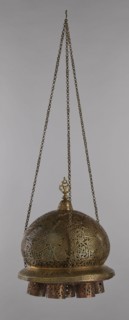 Lamp, Islamic art, Arabic, metal lighting fixture with geometric ornament and Arabic inscriptions.