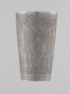 Mug, Islamic Mughal, Indian; 19th century, North India . Silver mug densely decorated with plant