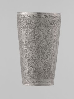 Mug, Mughal period, 19th century, North India probable. Silver mug densely decorated with plant and