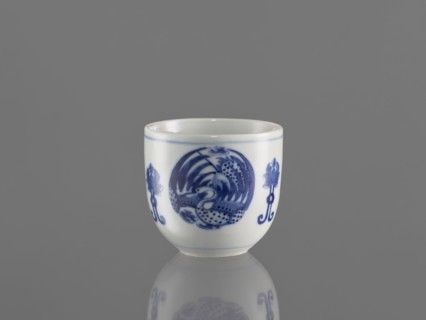 Bowl, ceramics, decorated with three phoenix images and stylized lotus flowers; blue-and-white