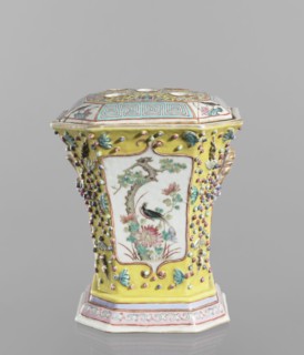 Vase with a lid; ceramics; colored porcelain; openwork perforated flat lid; decorated with flowers,