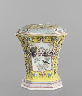 Vase with a lid, ceramics; colored porcelain, openwork; flat perforated lid; decorated with