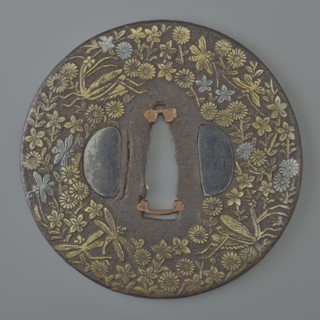 Crossguard tsuba, Mino school, Japanese, Edo period 1603–1868, 18th century. Round tsuba maru gata