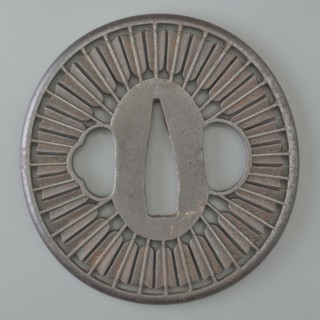 Crossguard tsuba, Tsunetada maker, Japanese, Edo period 19th century. Round tsuba maru-gata with a