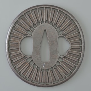 Crossguard tsuba, Tsunetada,  craftsman; decorated with an openwork positive design of thirty-two