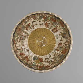 Bowl by Toyota Masanobu author/craftsman. Deep bowl on a low, ring-shaped base with a knobbed body