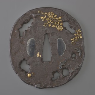 Crossguard tsuba, Edo period 18th century, 1603–1868, Japan. Oval tatemaru gata tsuba with an