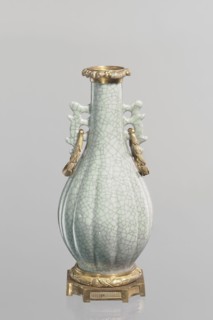 Vase, Chinese, Qing 1644–1911, 19th century. Celadon ceramic slender vase with a long neck and