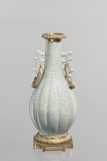 Vase; Chinese; Qing 1644–1911; 19th century. Celadon ceramic decorative vessel — slender vase with