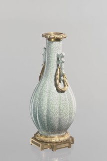 Vase, Chinese, Qing dynasty 1644–1911, 19th century. Celadon ceramic slender vase with long neck
