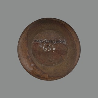 Tea canister chaire of the mimitsuki type. Brown container with two handles and a lid in a navy