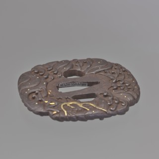 Crossguard tsuba, Kikuchi Tsunekatsu 1704-? maker; Tsuba in the shape of a mokkô quatrefoil with