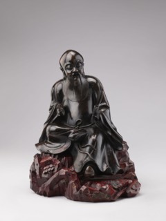 Sage sitting on a rock base;, Chinese art; Chinese culture; Qing 1644–1911; figurine of a