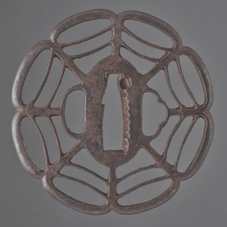 Crossguard tsuba, Tomotsugu; Japanese, Edo period 1603–1868, 19th century, Japan. Openwork tsuba