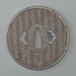 Crossguard tsuba, maker: Tômei, unknown provenance; Japanese Edo period, Bunka era 1809. Iron tsuba