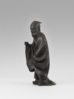 Sage, unknown sculptor; figurine of a Chinese sage man, scholar wearing a long flowing robe and a