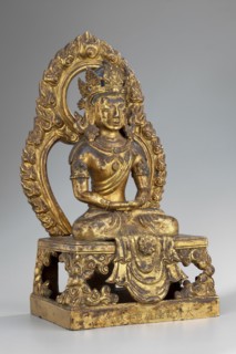 Amitayus, Buddha of Infinite Life, shown seated in a meditative pose with hands folded in a