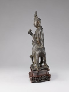 Buddhist deity on a buffalo on a base; figurine; Chinese; lotus iconography; Chinese Buddhism; Qing